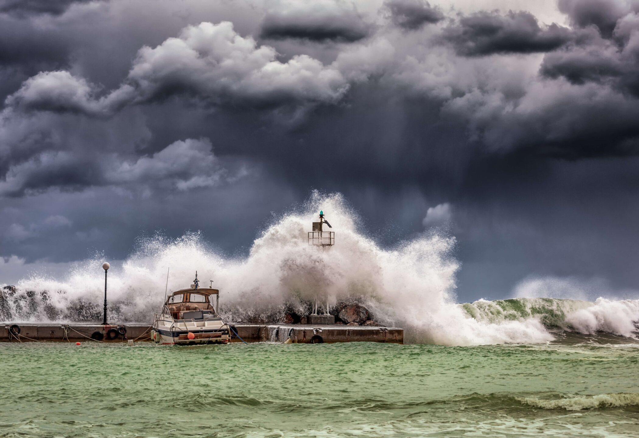 Big waves under cloudy sky